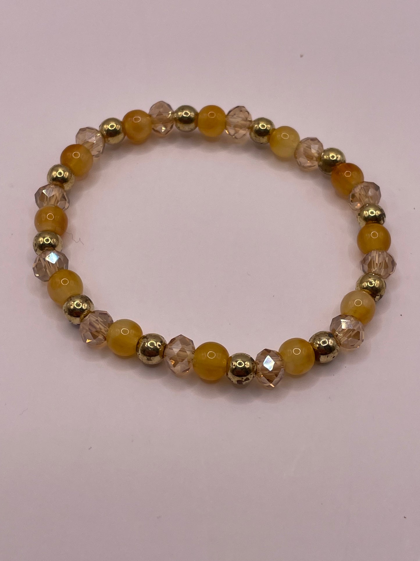Stretch armband gold/shine/pastel/orange