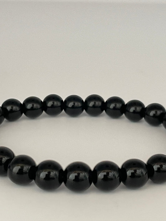 Stretch armband kralen zwart shine 4 mm