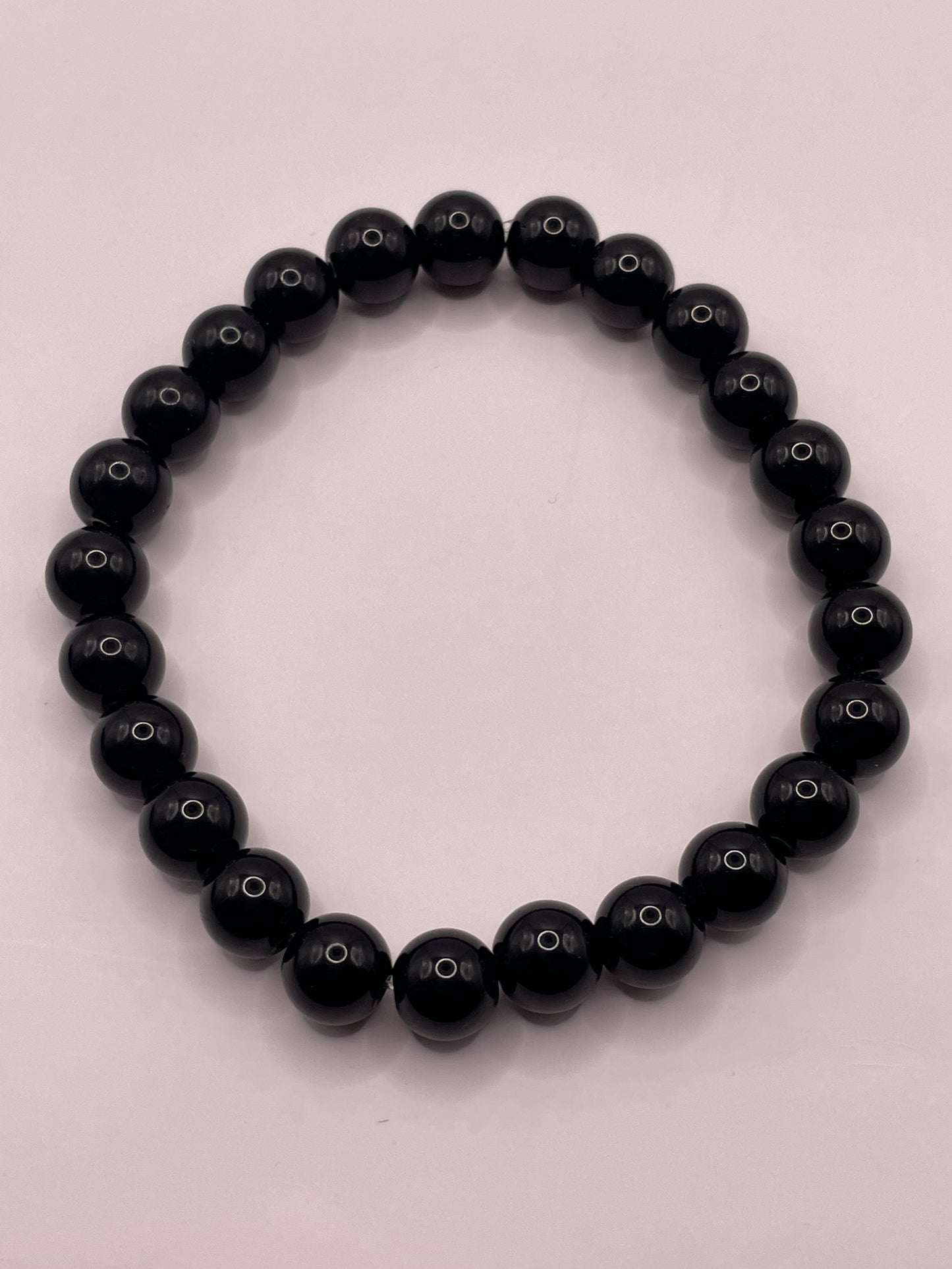 Stretch armband kralen zwart shine 6mm