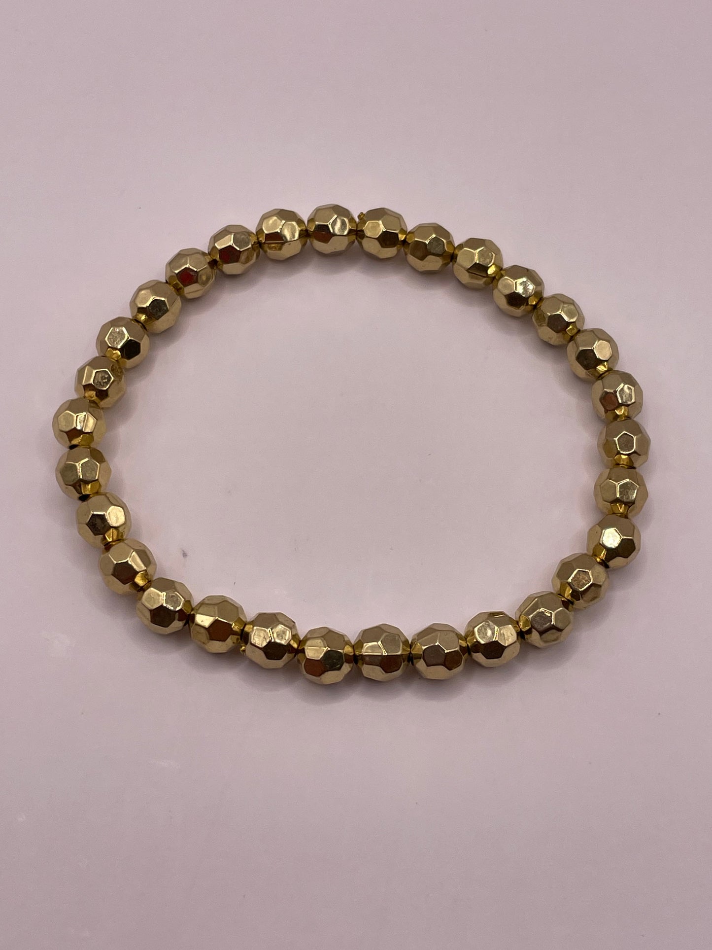 Stretch armband kraal gold/disco 5mm