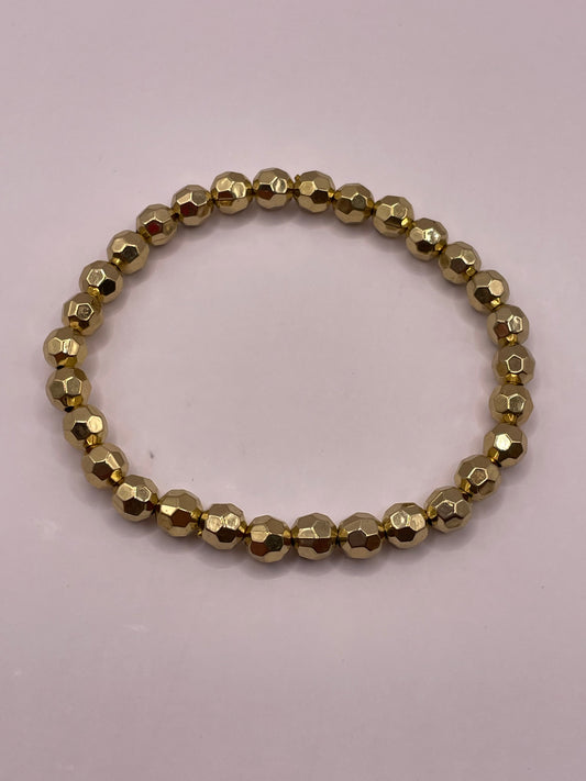Stretch armband kraal gold/disco 5mm
