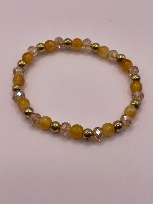 Stretch armband gold/shine/pastel/orange
