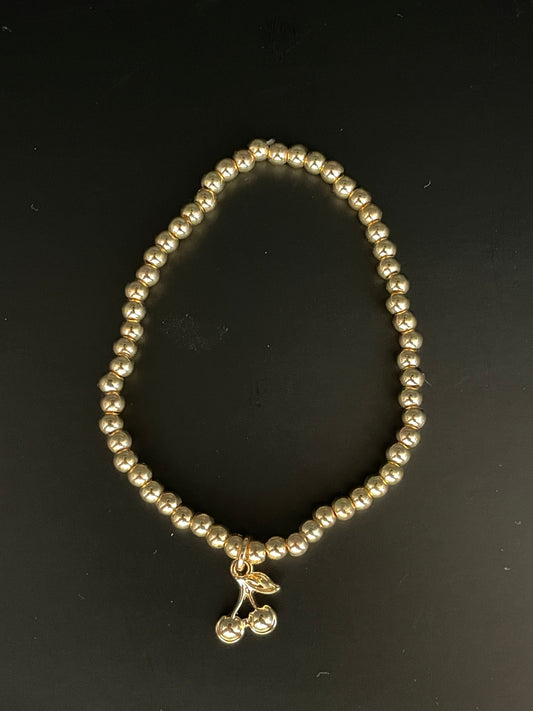 stretch armband goud/kers