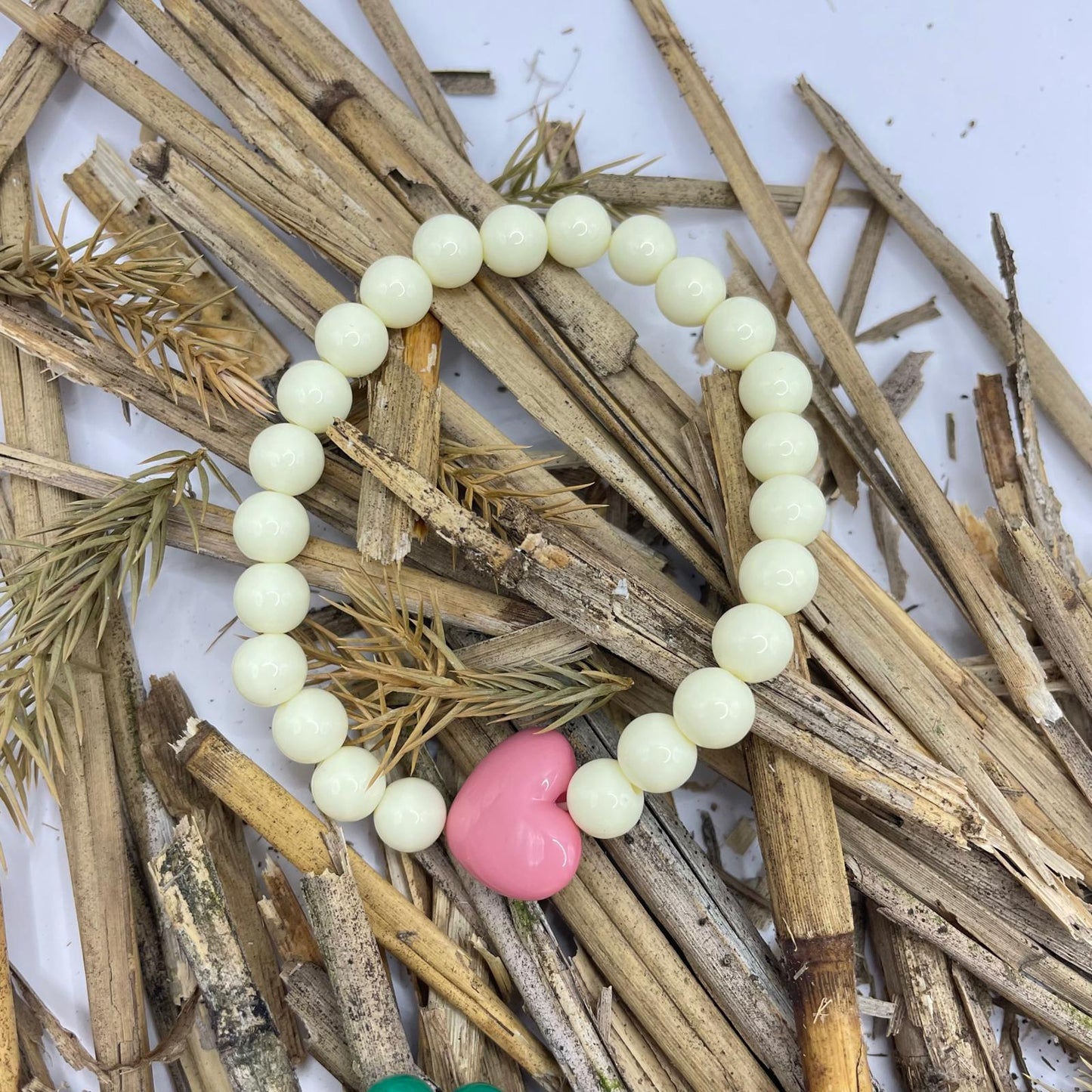 Stretch kralen armband met hartje